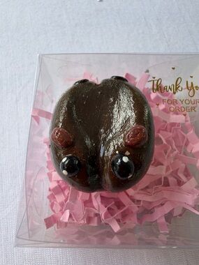 Coffee Bean Shaped Treat with Pink Accents